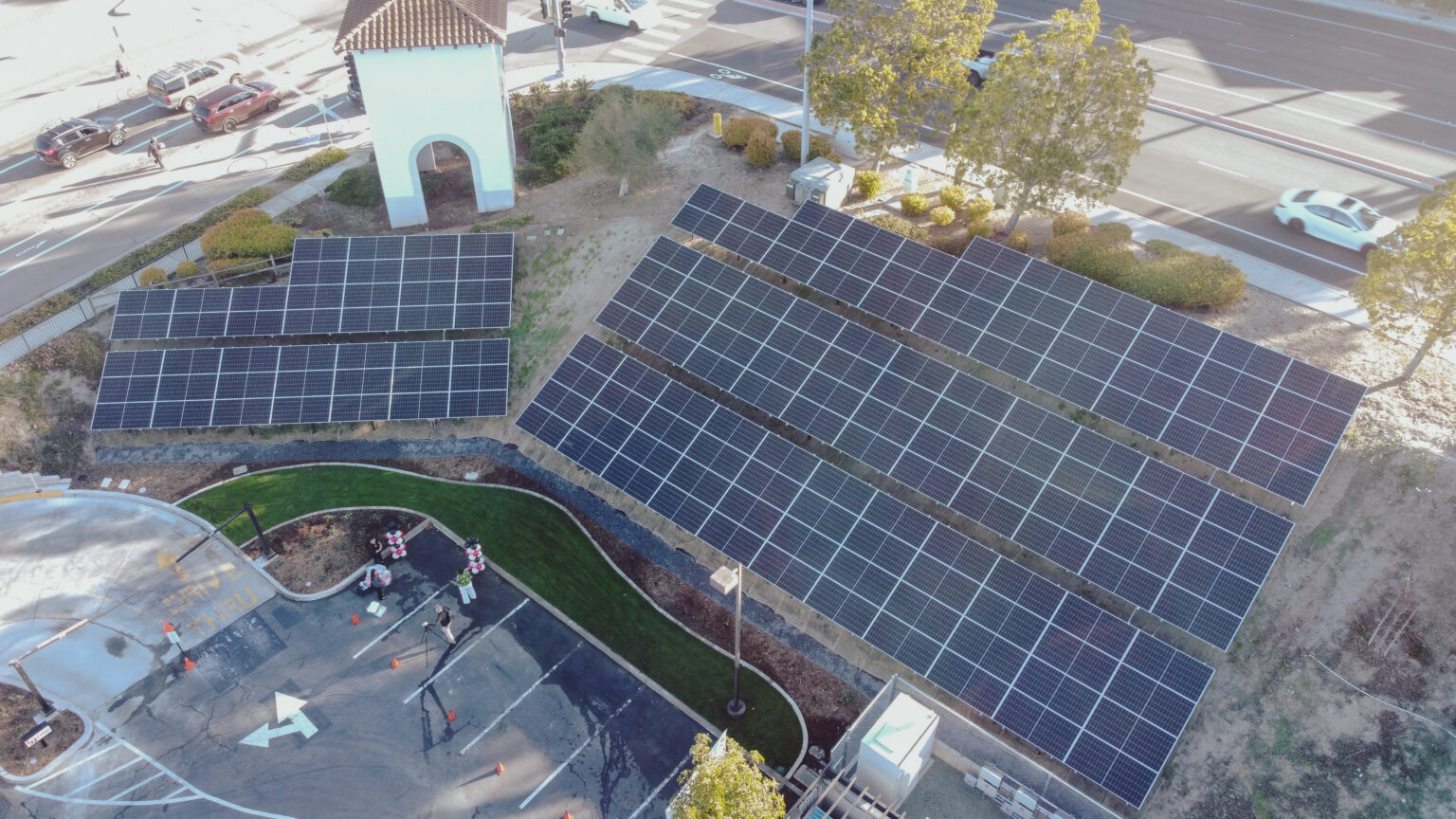 Aerial view of solar array on slope of parking lot